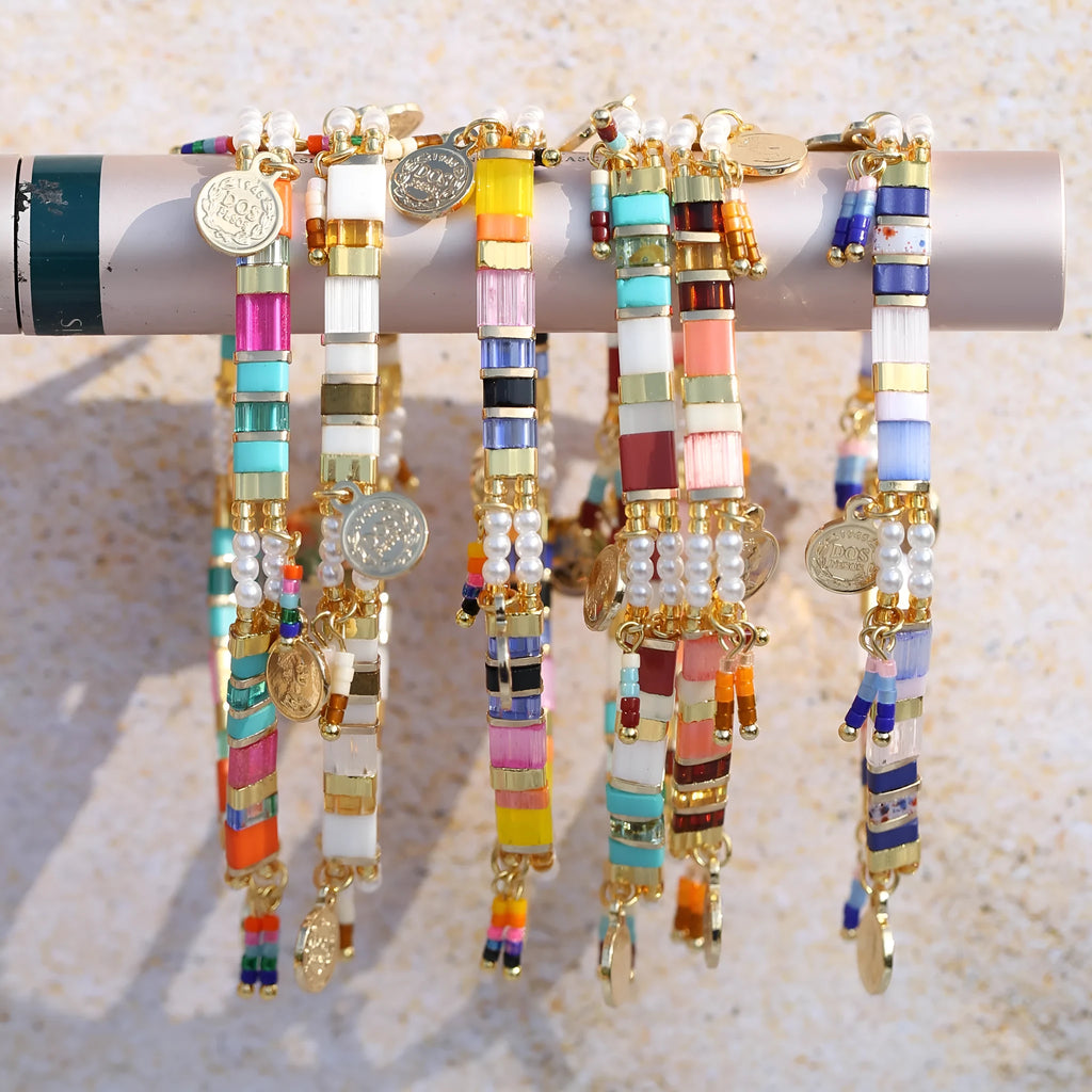 Handcrafted women's beaded bracelet with glass and imitation pearl elements in six colour styles