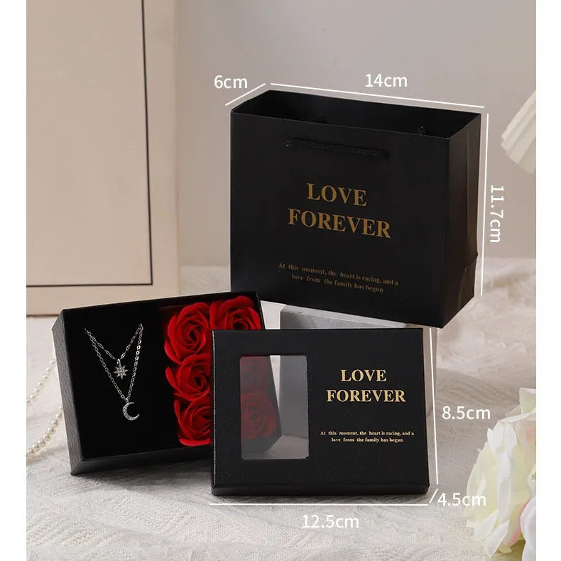 Six red soap roses in a black gift box with a matching handbag, a Korean style Valentine's gift set.