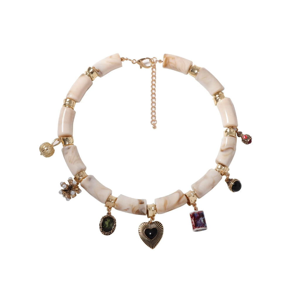 Women's bamboo design heart-shaped resin pendant necklace with electroplated finish.