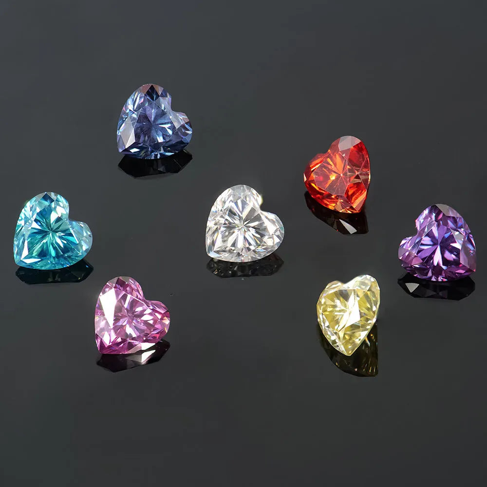Loose lemon yellow heart-shaped moissanite gemstone on a plain background.
