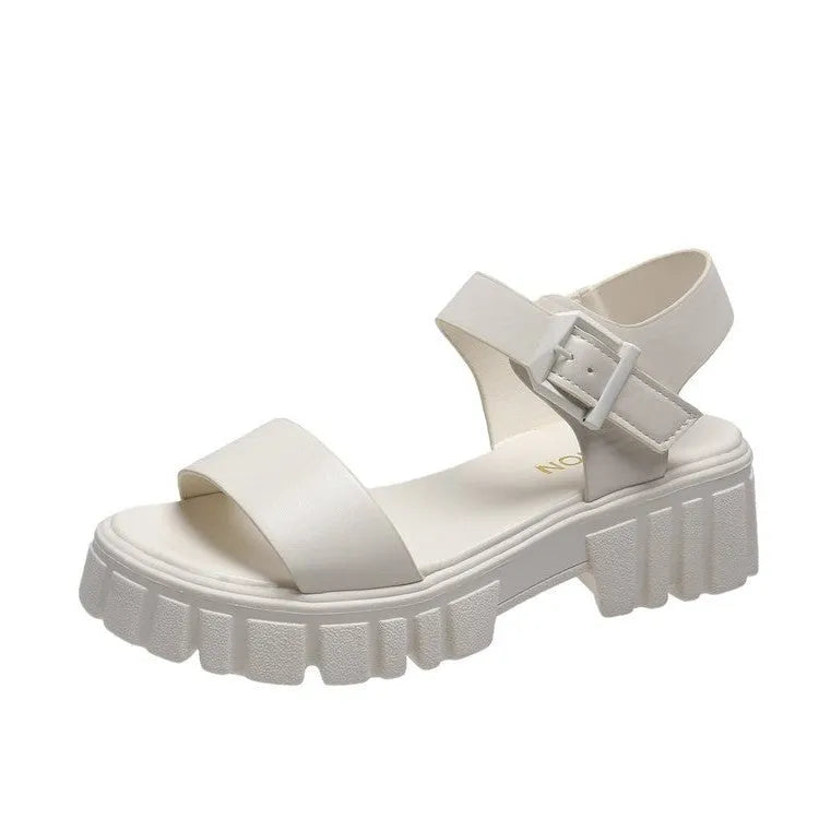 Women's beige platform sandals with peep toe and ankle-strap buckle on white background