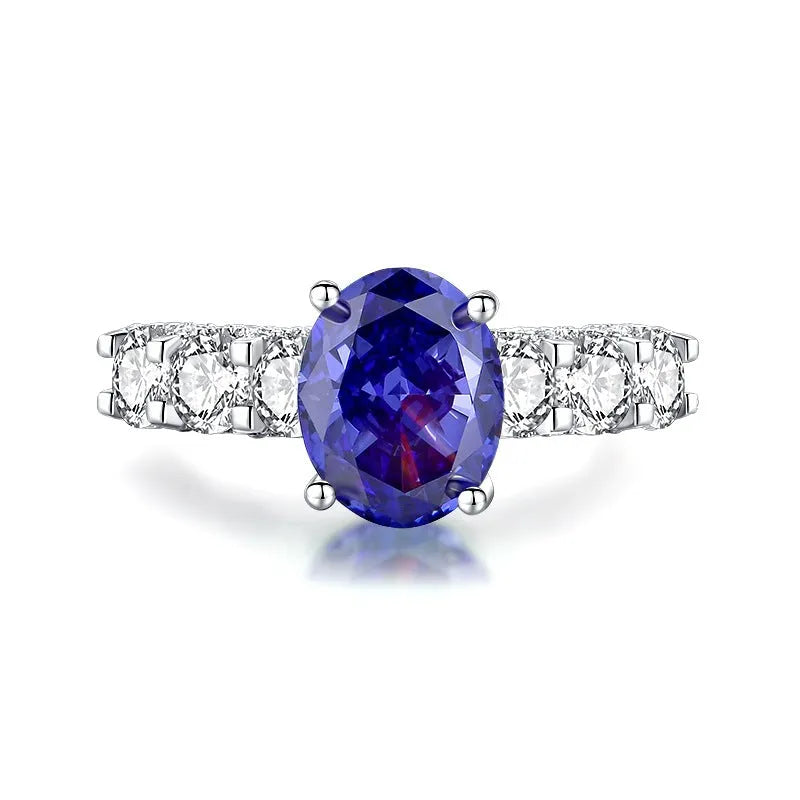Heart-shaped sterling silver ring with a diamond ice flower cut Tan Sang colour zircon stone.