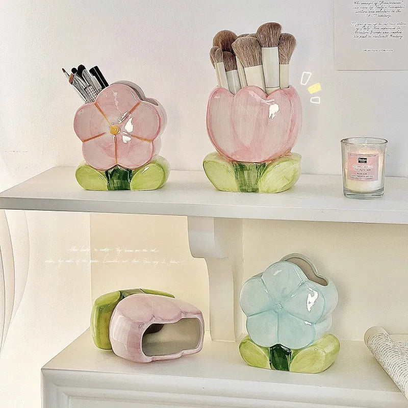 Ceramic pen holder box with floral pattern for desk organisation.