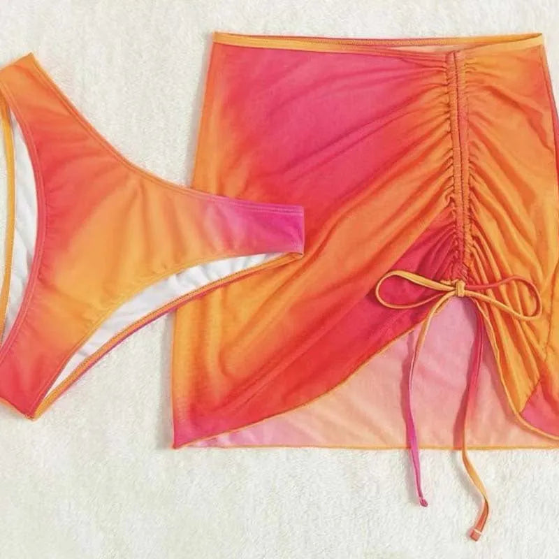 Women's orange and purple gradient print swimsuit with hollow suspender and loop buckles