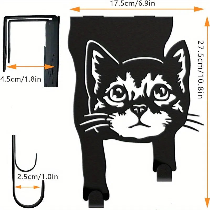 Black iron cat-shaped decorative wall hook for doors and rooms.