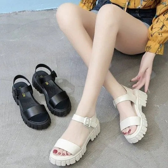 Women's beige platform sandals with peep toe and ankle-strap buckle on white background