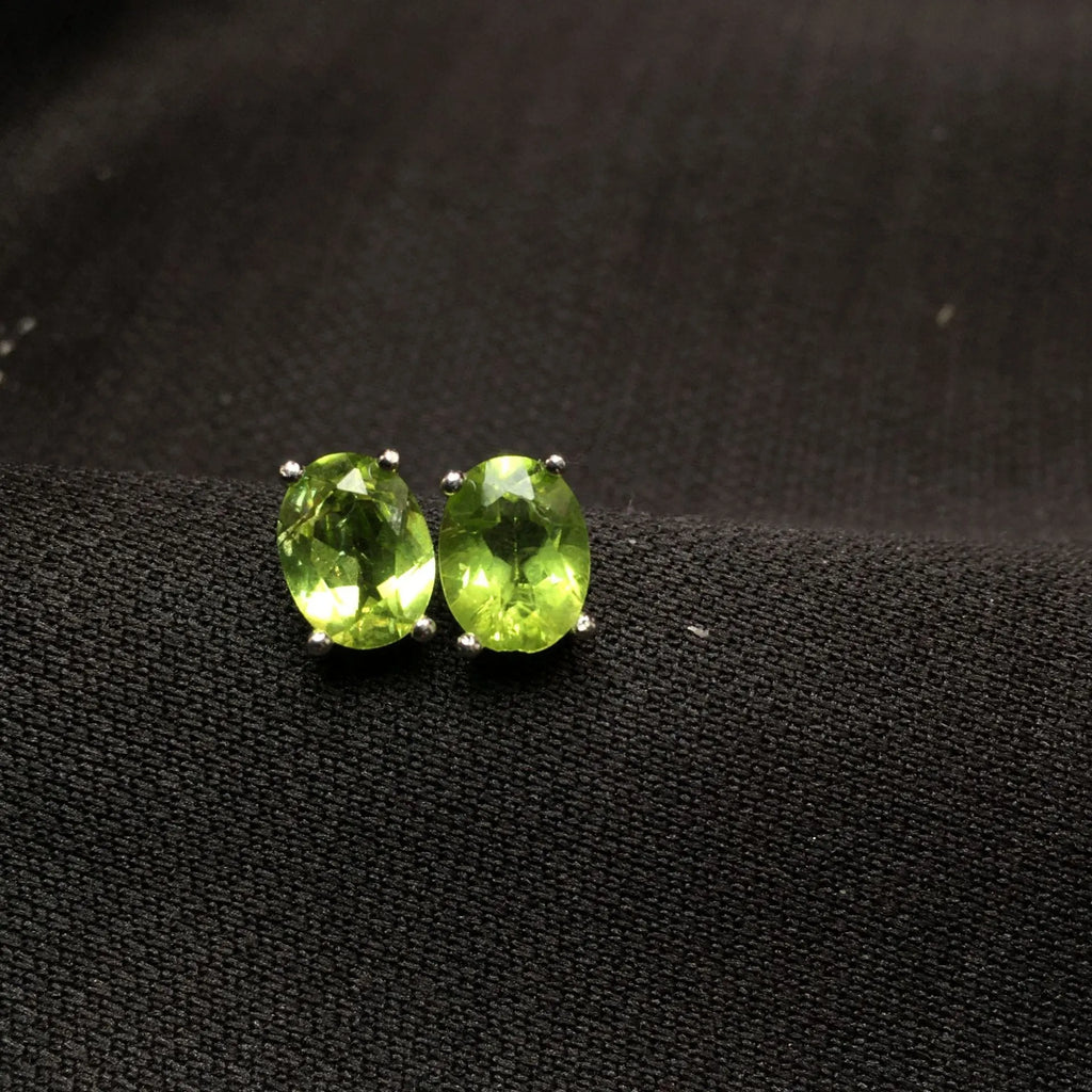 Natural olivine faceted stud earrings in S925 sterling silver with 6×8mm oval green stones