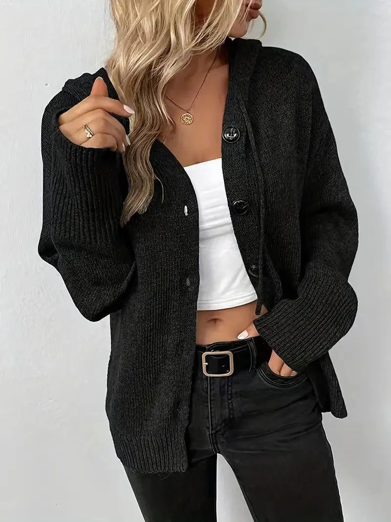 A thick grey cotton hooded cardigan sweater with a single-breasted front and long sleeves, shown on a model.