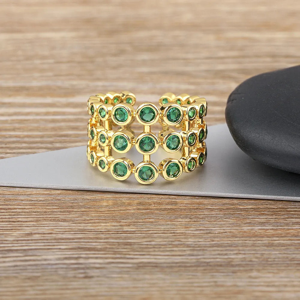 Gold plated copper three-layer ring with green colour and zircon detailing