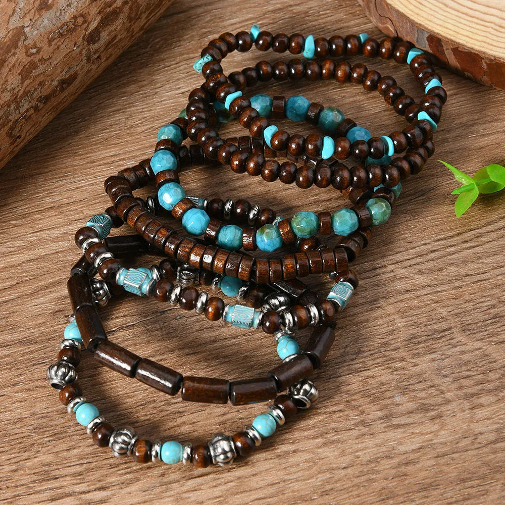 Set of seven layered retro bracelets with wooden beads, alloy metal, and multicolour stones.