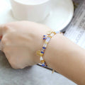 Handcrafted women's beaded bracelet with glass and imitation pearl elements in six colour styles