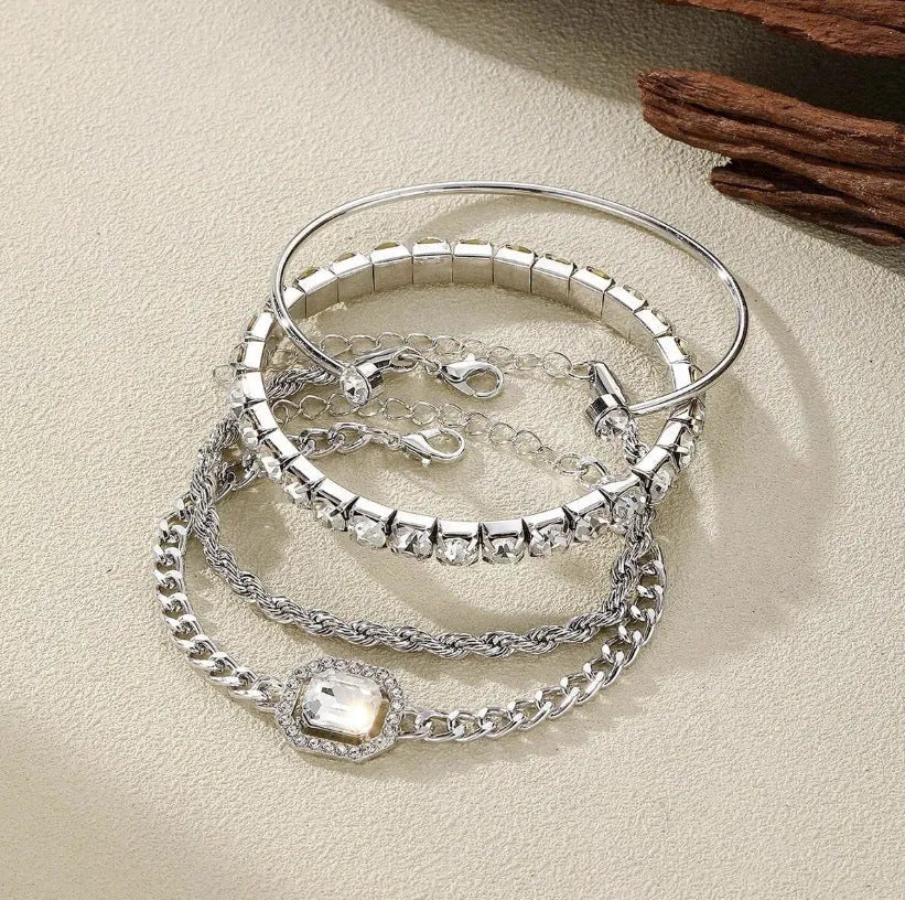 Women's retro geometric jewellery four-piece set with square diamond links in gold and silver options