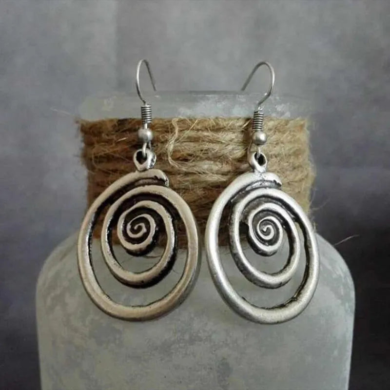 Retro geometric spiral distressed silver alloy earrings measuring 2.6cm by 5cm
