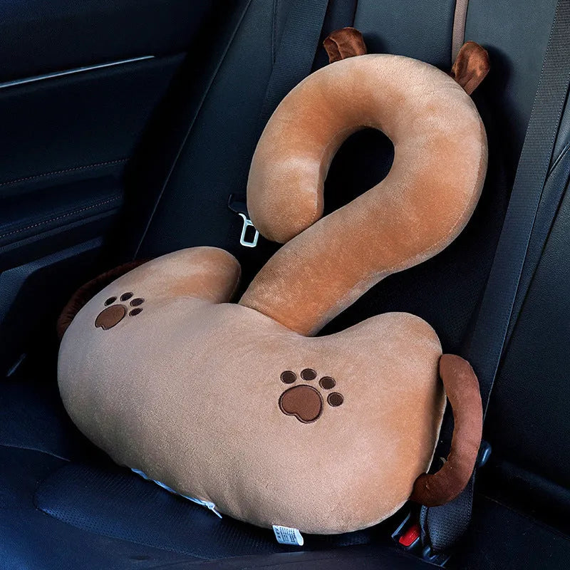 Square cartoon question mark shaped cushion with animal print, shown in light cat colour for scale.