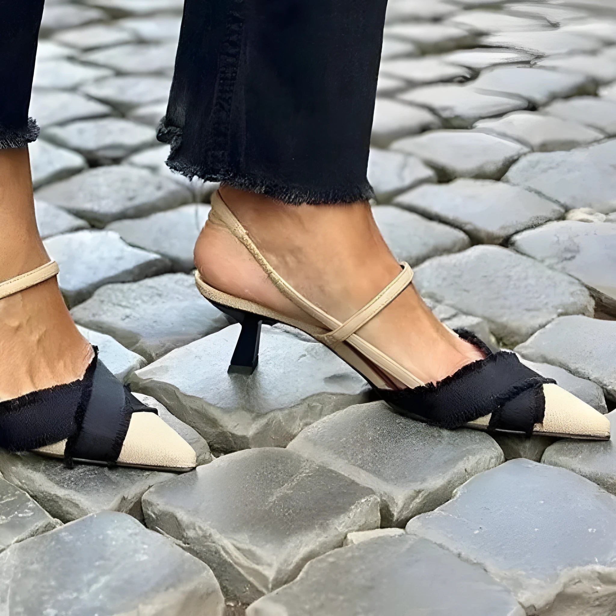 Apricot and black colour block women's stiletto sandals with a pointed toe and ankle buckle.