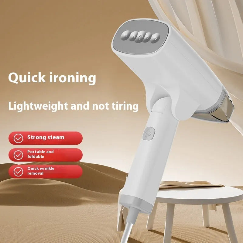 Blue and white handheld garment steamer with 1300W power rating and 85ml water tank
