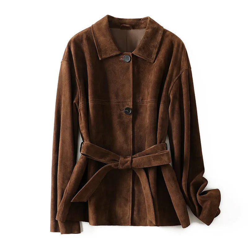 Yellow brown mid-length cashmere coat with a Peter Pan collar and decorative leather stitching on the front.