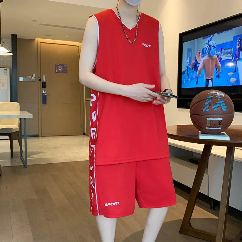Light grey polyester basketball vest and shorts sports suit laid flat