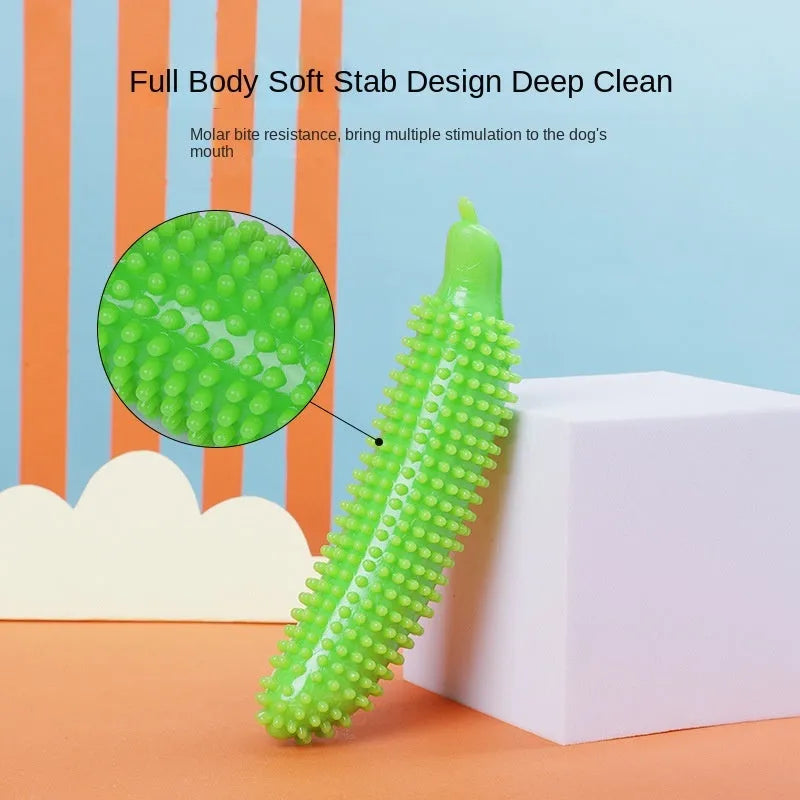 Soft green cucumber-shaped dog chew toy for teething and bite-resistant play.