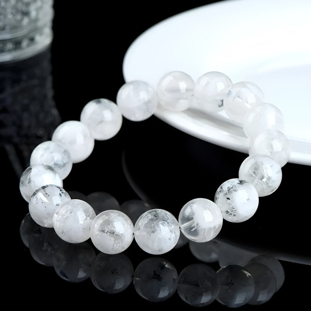 Women's crystal bracelet with round blizzard snowflake pattern beads, showing geometric and traditional design.