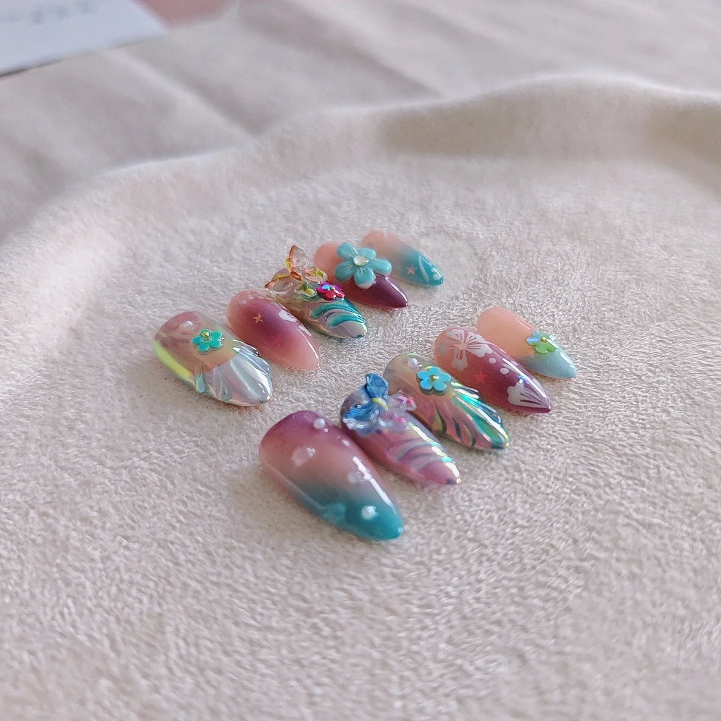 Handmade nail art stickers with colourful floral and butterfly embossed designs