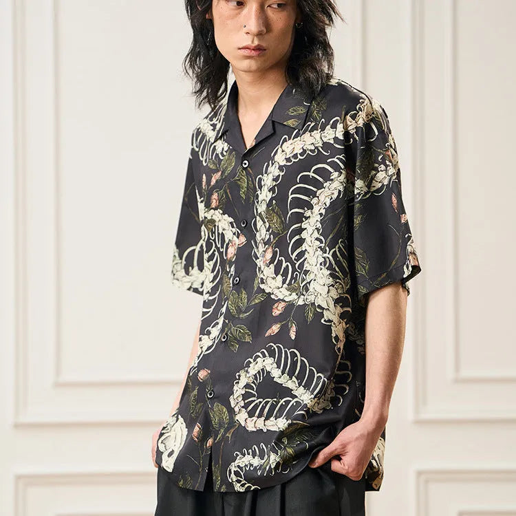 Short sleeve Cuban collar shirt with snake bone and floral pattern in a colour block style.