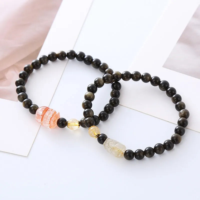 Handmade natural obsidian Pi Xiu bracelet with ethnic zodiac design in gold or red colours