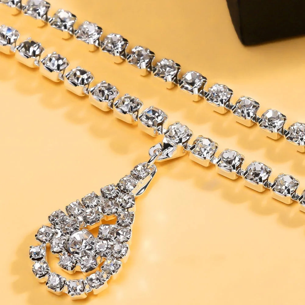 Gold women's waist chain with drop pendant and rhinestone details, 115cm length with lobster buckle