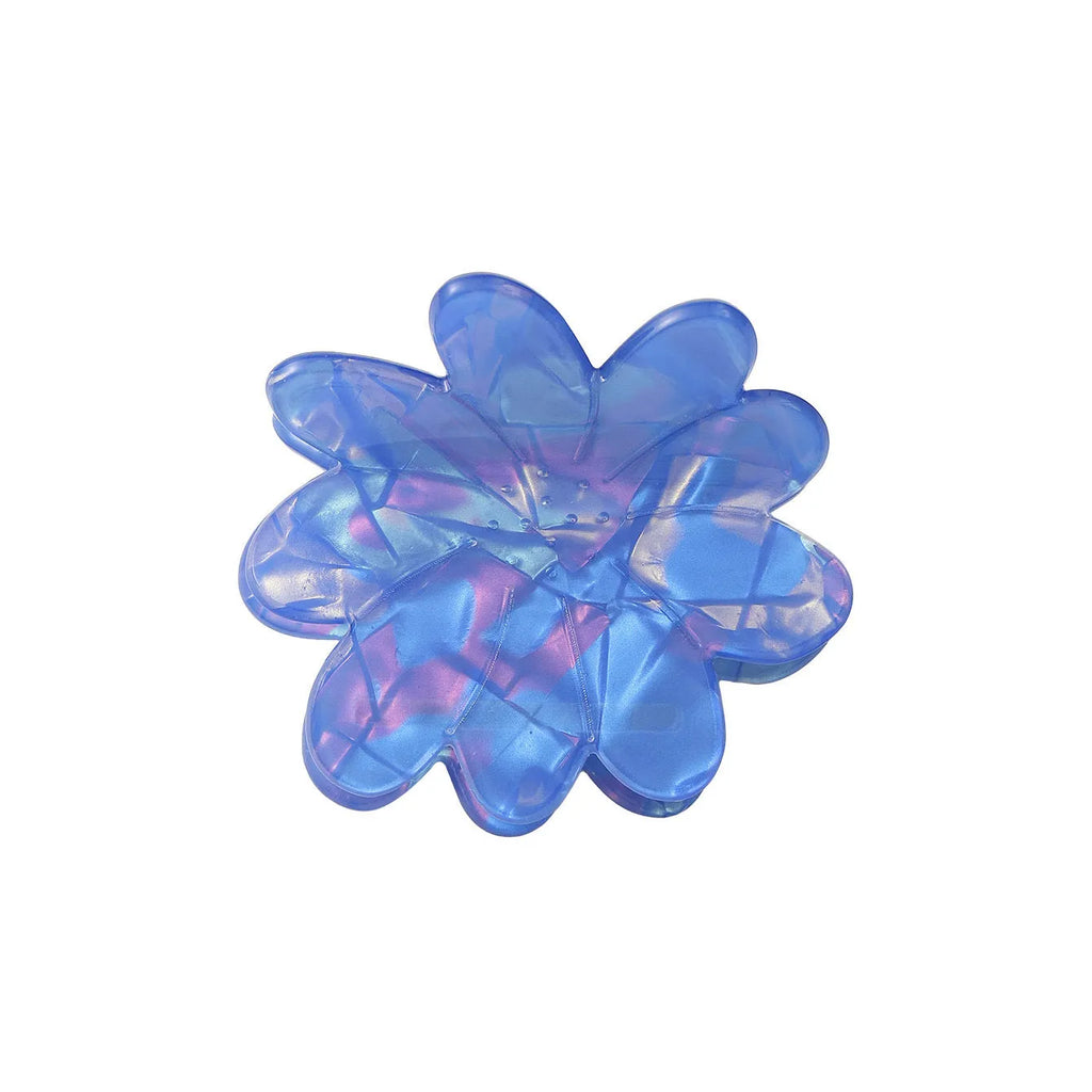 Dazzling blue PVC flower hair clip with glossy finish, 6cm length, on a light background