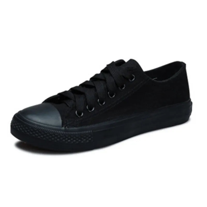 Women's solid colour canvas casual shoes in multiple colour options on a white background.