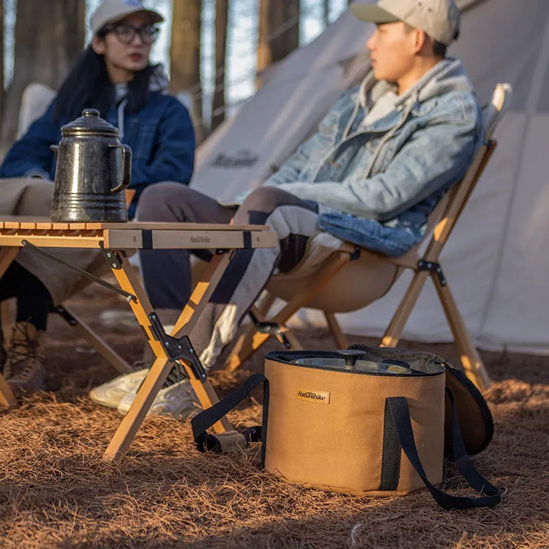 Thickened canvas camping storage bag in barrel design, large size, with blue trim and carry handles