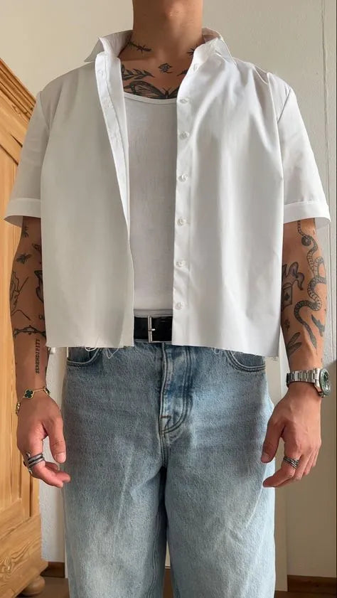 Men's plain white short sleeve polyester shirt with a regular fit and cropped top length.