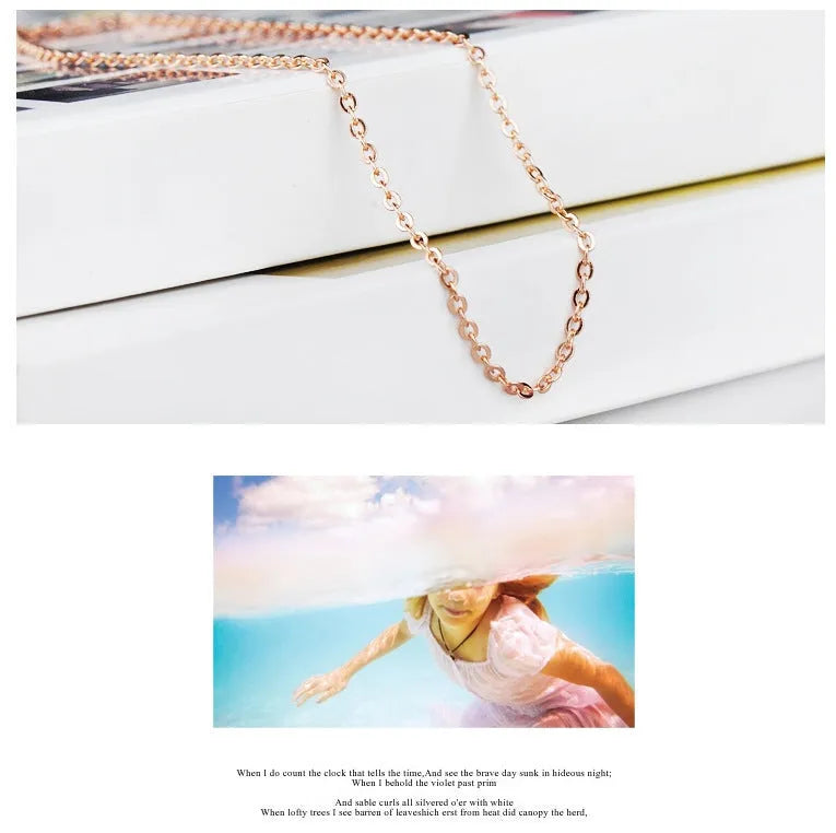 Heart-shaped pink crystal pendant necklace with rose gold cross chain for women