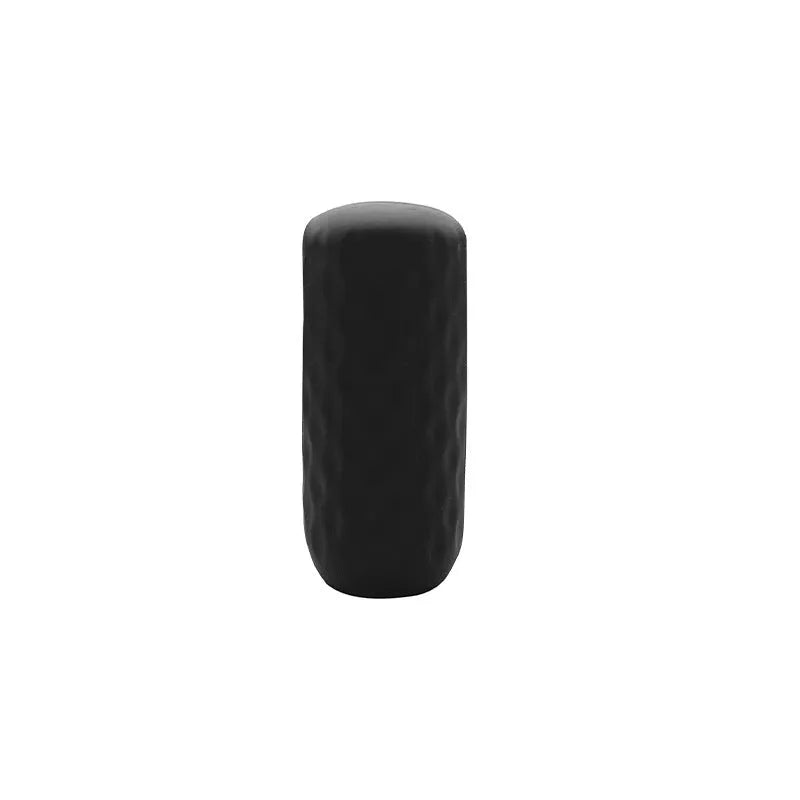 Set of six silicone travel bottle protective cases in sky blue, mint, yellow, white, pink, and black on a white background