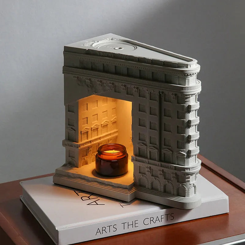 Wukang Building concrete wax lamp with halogen fixtures in white on a wooden table