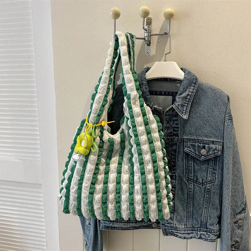 Women's pleated bubble crossbody bag in soft polyester with pendant accessory in vertical square design