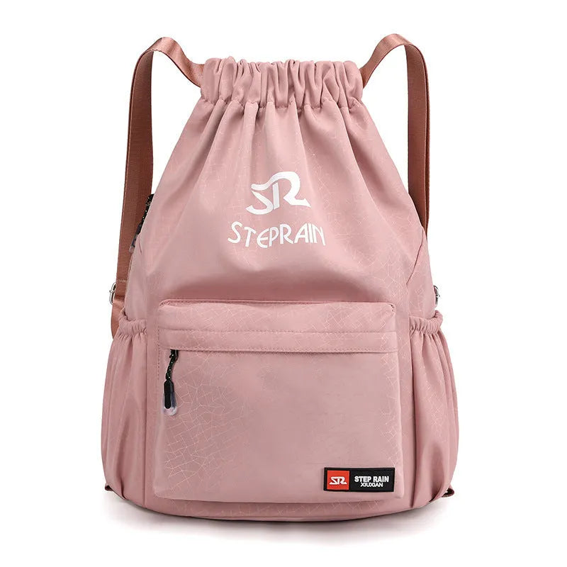 Lightweight solid colour Oxford cloth backpack with drawstring closure and double shoulder straps.