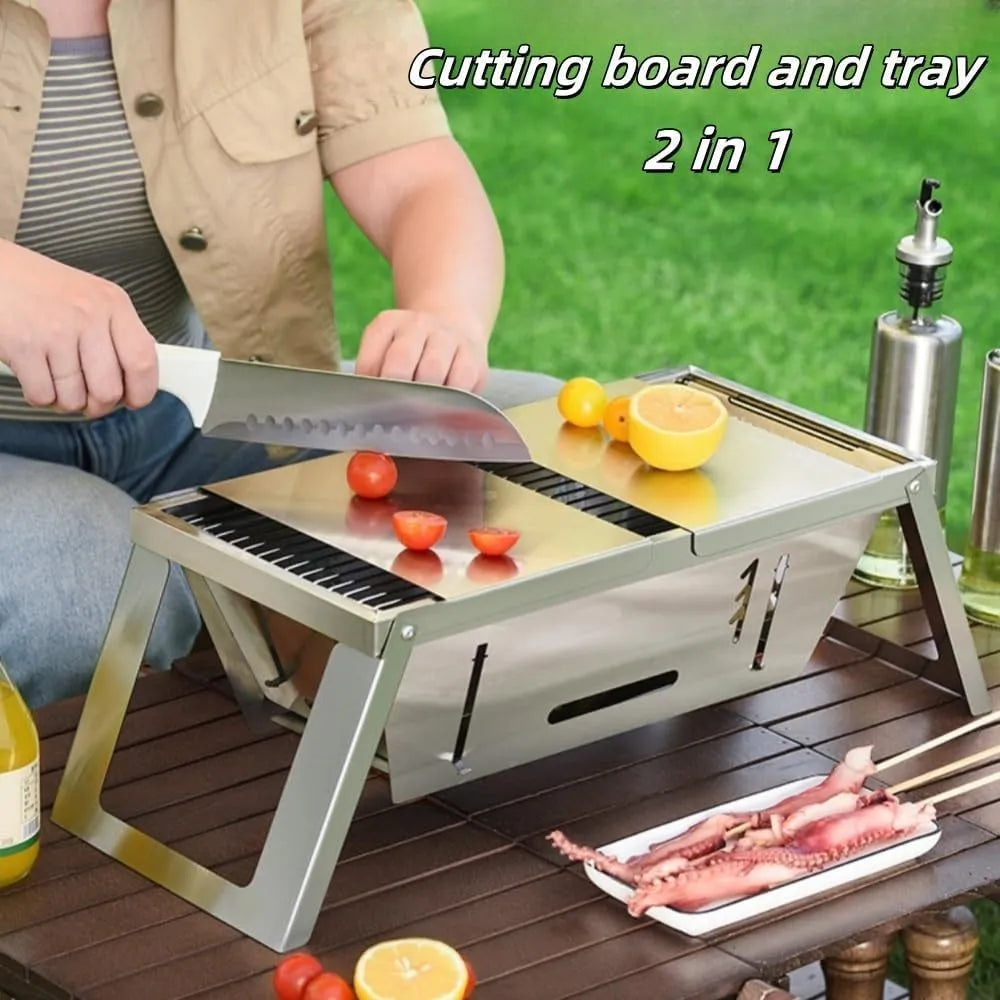 Small collapsible charcoal barbecue grill with folded legs, shown flat-packed.