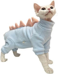 Green fleece dinosaur costume on a hairless Sphynx cat, showing tail and spine details.