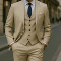 Men's champagne three-piece suit with vest, jacket, and trousers in slim-fit style on a hanger