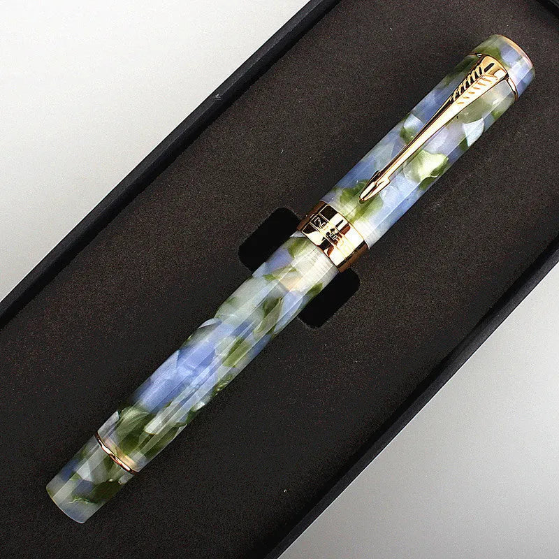 Deep bath green metal ballpoint pen with three interchangeable nib options shown