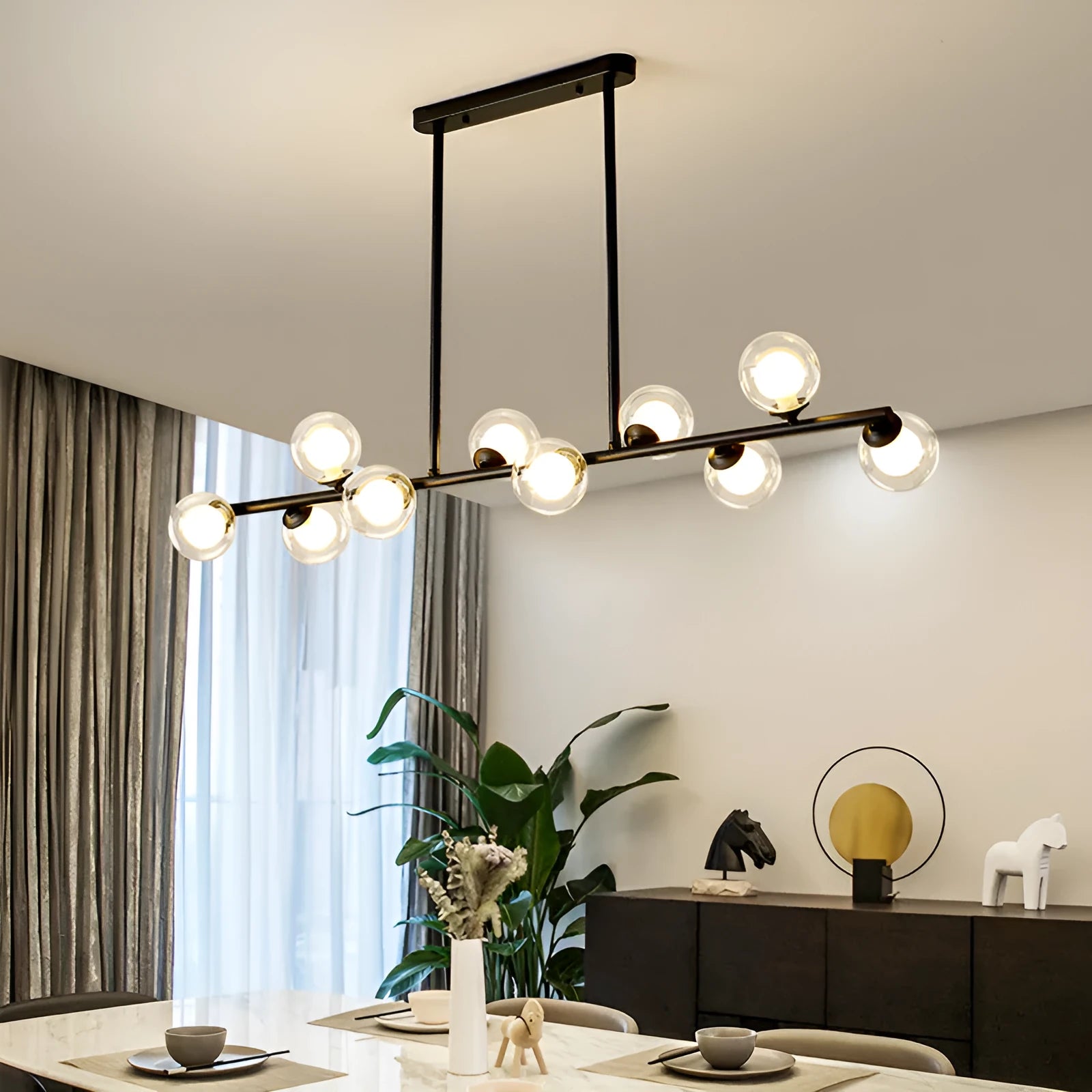 Modern minimalist glass bubble ball chandelier with 6 black arms and clear glass shades