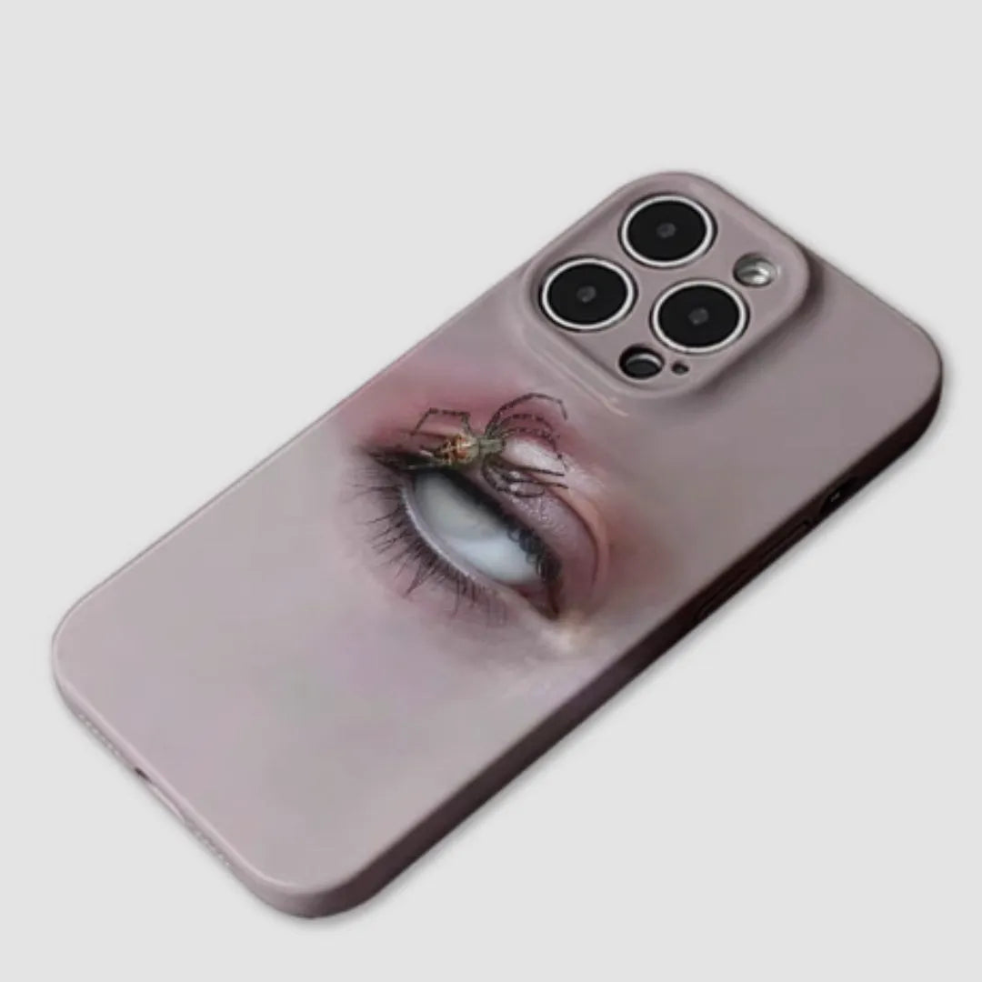 Dark heterochromatic spider design on a frosted resin protective case for iPhone.