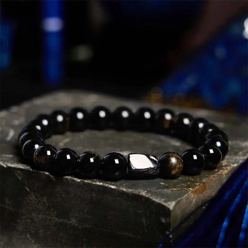 Obsidian single ring bracelet with 8mm beads and constellation design in gold obsidian colour