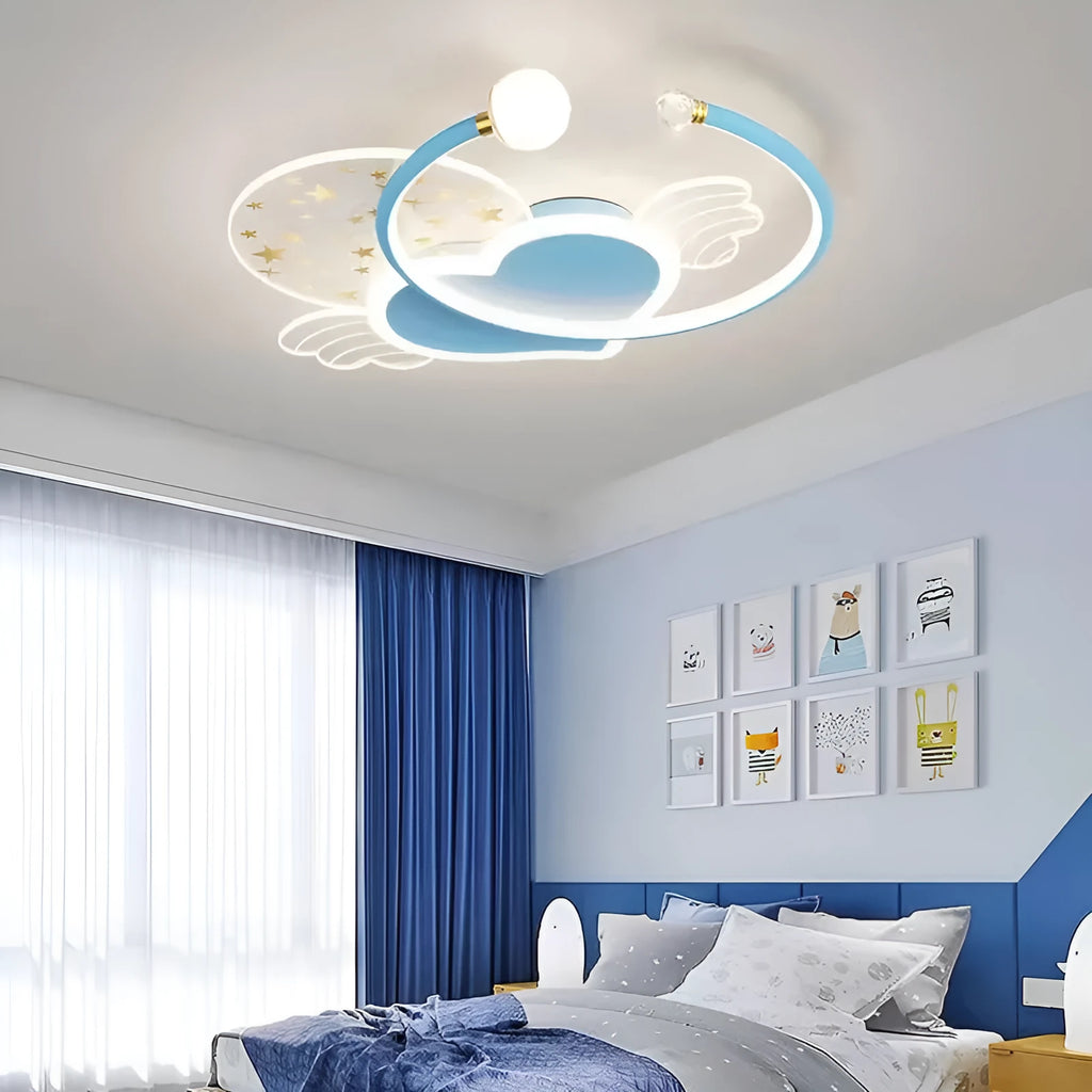 Children's room ceiling lamp with creative moon and cloud design in blue colour on a white ceiling.