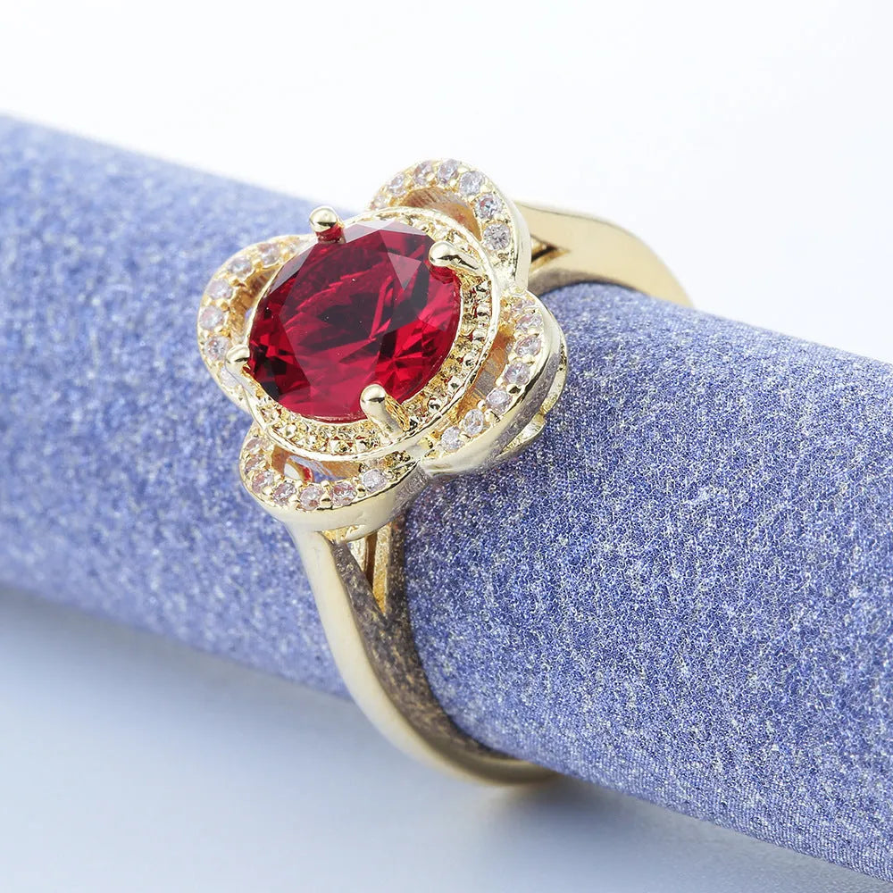 Copper ring with a silver-toned zircon fruit-shaped inlay on a band.