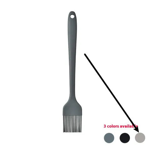 Black silicone kitchen utensil set with 12 tools in a rotating storage bucket on a kitchen countertop