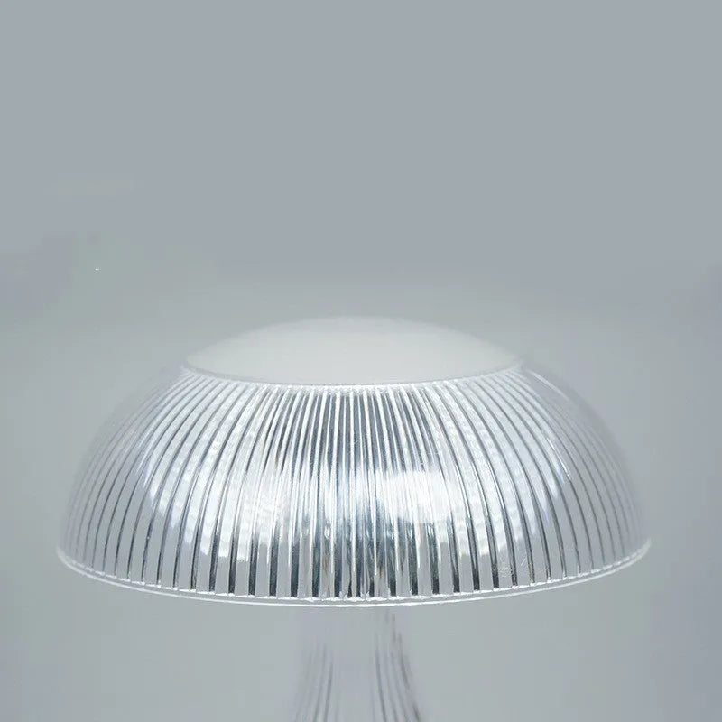 White USB rechargeable touch control night lamp with acrylic body on a table