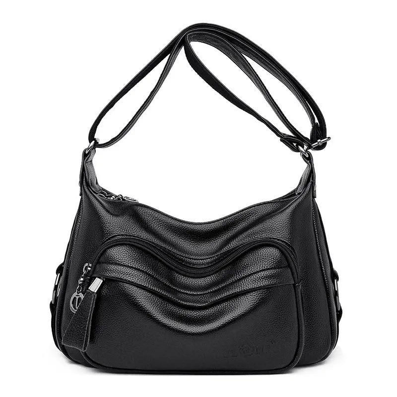 Large black women's crossbody shoulder bag with multiple internal compartments and zip closure