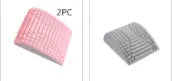 Blue back stretcher pillow for lumbar and neck support on a grey background.
